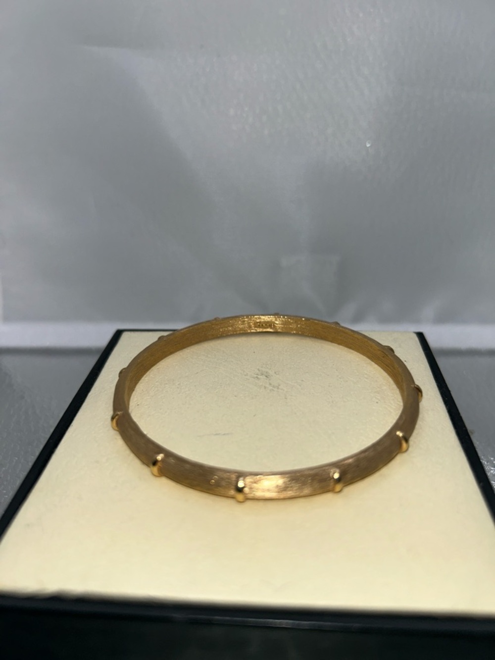 Vintage trifari bangle sleek gold tone brushed texture raised accents classic